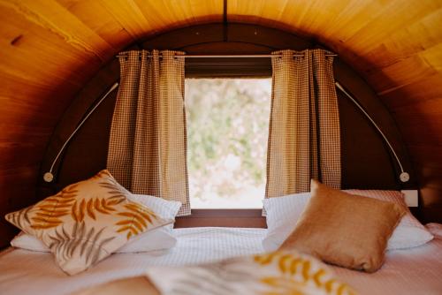 En eller flere senge i et værelse på Los barriles, FincaSeguroBodega