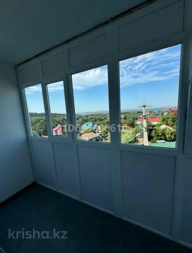 a room with a window with a view at Boroboye, Burabay, Kazakhstan in Borovoye