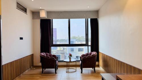 Posezení v ubytování Pheonix Luxury Inn