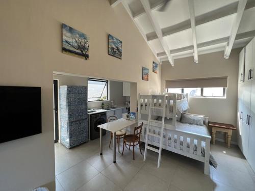 Et opholdsområde på Sting-ray Cottage