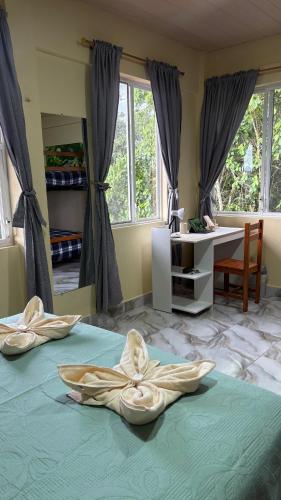 Posteľ alebo postele v izbe v ubytovaní Hostal Tena Ñaui