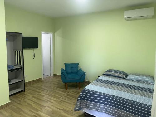 En eller flere senge i et værelse på Studio Completo no Centro de Foz