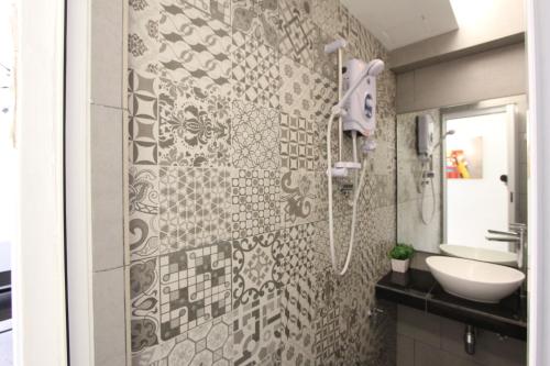 Kylpyhuone majoituspaikassa Cosy Stay Melaka