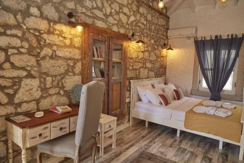 Postel nebo postele na pokoji v ubytování MorisiAvluAlaçatı