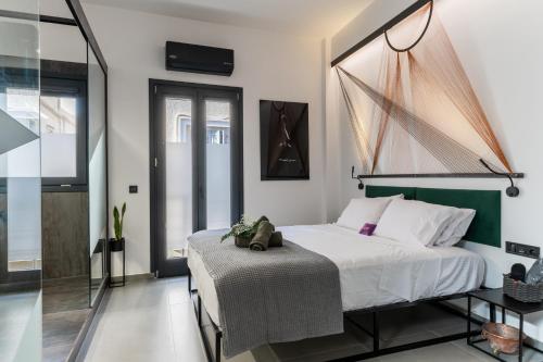 Giường trong phòng chung tại Artrock Experience Loft Gallery