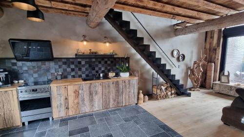 Η κουζίνα ή μικρή κουζίνα στο La suite 77 & Hindi