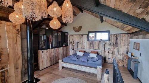 Ένα ή περισσότερα κρεβάτια σε δωμάτιο στο La suite 77 & Hindi