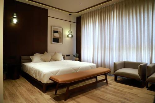 Postel nebo postele na pokoji v ubytování Hotel Aarka