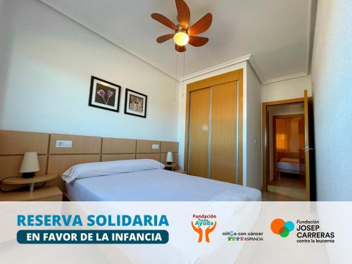 En eller flere senge i et værelse på Apartamentos Costamar 3000