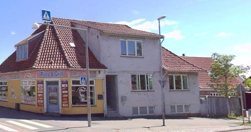 a building on the corner of a street at Private Rooms-Shared kitchen&bathroom- No host on site in Esbjerg