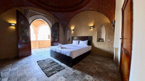 Ένα ή περισσότερα κρεβάτια σε δωμάτιο στο Saray El Omda - Wellness & Retreat Village