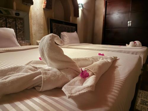 Ένα ή περισσότερα κρεβάτια σε δωμάτιο στο Saray El Omda - Wellness & Retreat Village