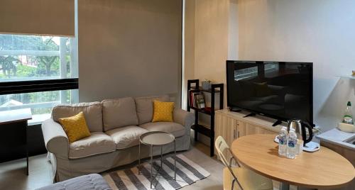 TV a/nebo společenská místnost v ubytování Lumi Tropicana - Unique Stays !