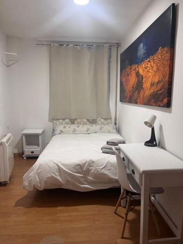 En eller flere senge i et værelse på HOSTAL MATILDAs