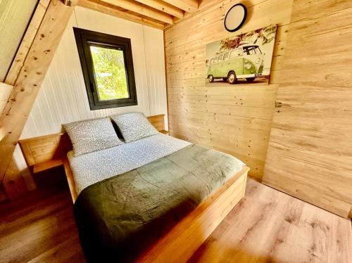 Postel nebo postele na pokoji v ubytování Le Tipi des Arnats