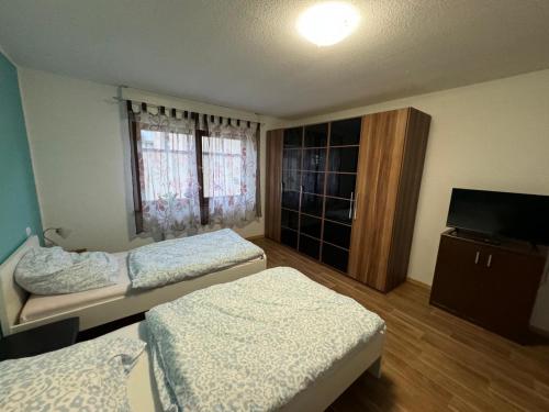 En eller flere senge i et værelse på GMA Apartment HR1