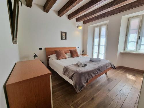 Postel nebo postele na pokoji v ubytování Grace Apartment