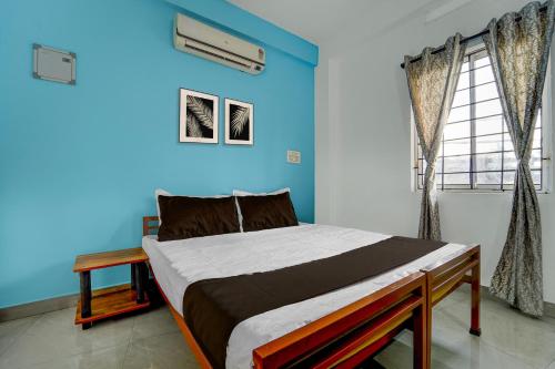 Ένα ή περισσότερα κρεβάτια σε δωμάτιο στο Hotel O HEAVEN REGENCY