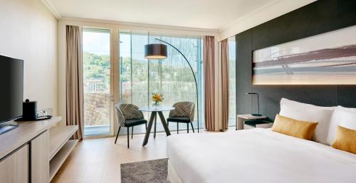 Voodi või voodid majutusasutuse Lyon Marriott Hotel Cité Internationale toas