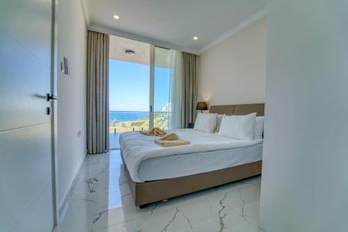 En eller flere senge i et værelse på Atlantis Malibu by Carrington