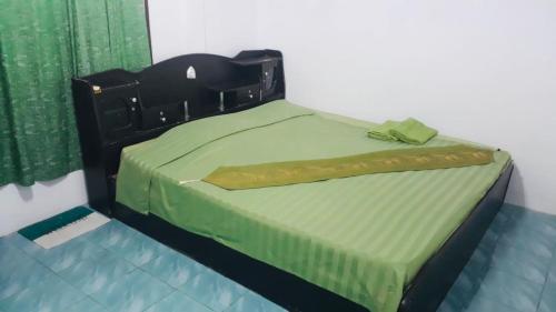 Giường trong phòng chung tại Pineapple Resort Sam roi yot