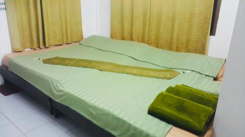 Giường trong phòng chung tại Pineapple Resort Sam roi yot