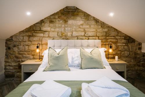 En eller flere senge i et værelse på Sun Street Retreats