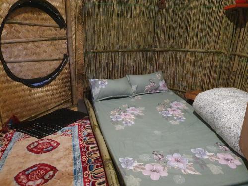 Postel nebo postele na pokoji v ubytování BiCa Eco-Village