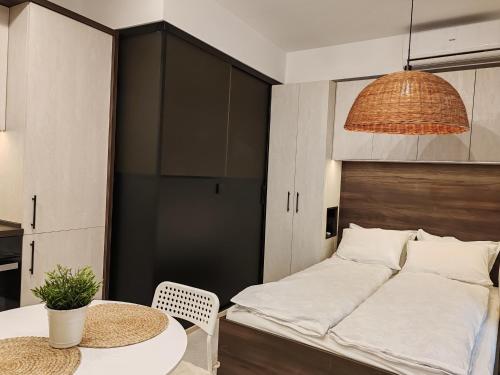 Een bed of bedden in een kamer bij SOHO apartments