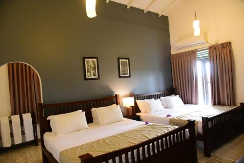 Postel nebo postele na pokoji v ubytování Cinnamon villa 30