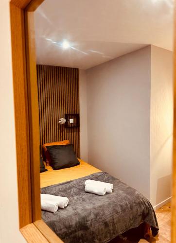 En eller flere senge i et værelse på L'Ecrin du Mallarmé - WiFi - Neuf