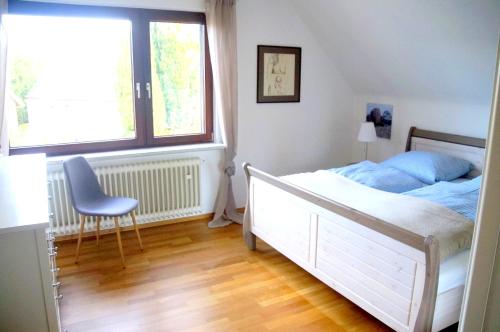 En eller flere senge i et værelse på Comfort Palace