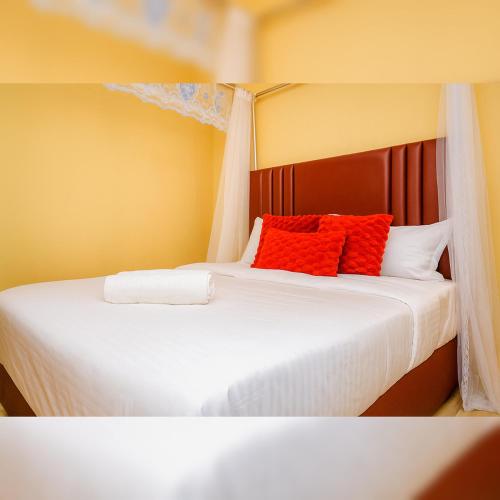 En eller flere senge i et værelse på Afrivie Homes 1-Bedroom Apartments in Kisii Town
