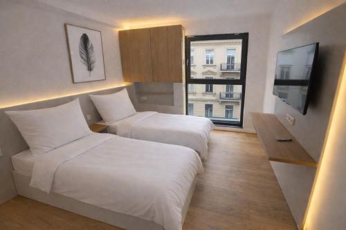 En eller flere senge i et værelse på Evermore Nürnberg - Fürth