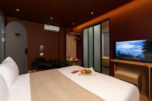 TV/trung tâm giải trí tại LUMI Reverside Hotel