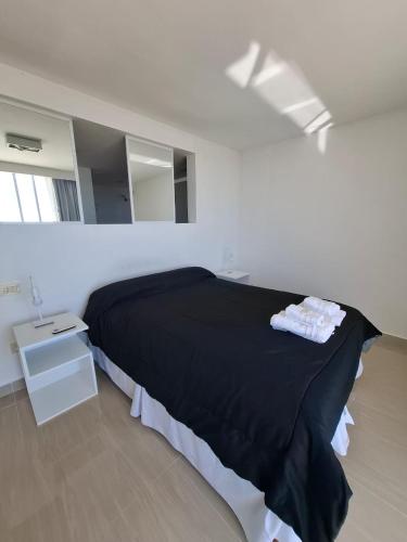 En eller flere senge i et værelse på Dpto MIRADOR DEL RIO