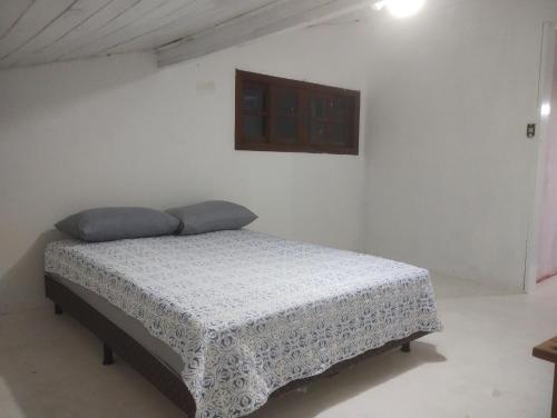 En eller flere senge i et værelse på Casa de temporada praia dos Ingleses - norte da ilha