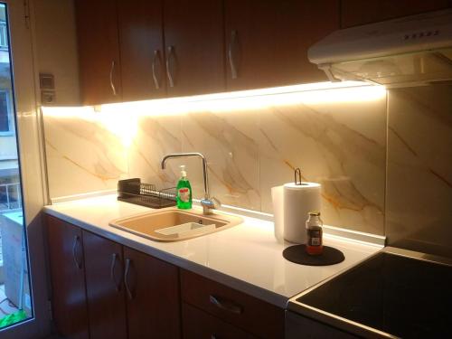 Køkken eller tekøkken på MaisonCentrale Apartment Downtown