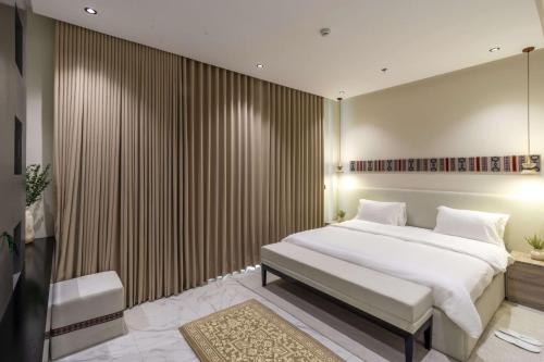 Giường trong phòng chung tại Marabea make yourself at home