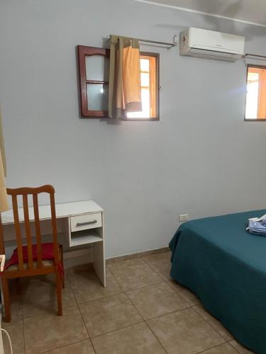 En eller flere senge i et værelse på Habitación Individual