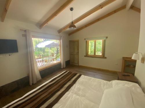 En eller flere senge i et værelse på Valle de Elqui Cabañas Elquisco