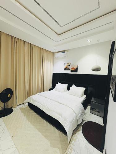 Ένα ή περισσότερα κρεβάτια σε δωμάτιο στο TravellersXperience Villa