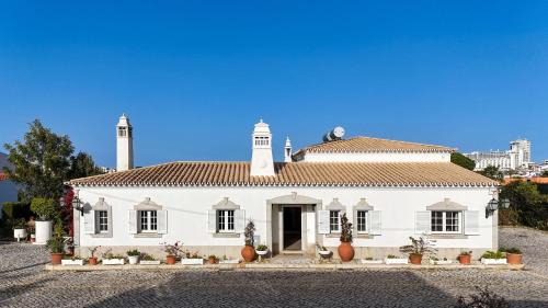 Photo de la galerie de l'établissement Villa das Buganvilias by Delilah Collection, à Albufeira
