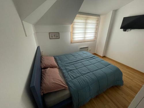 En eller flere senge i et værelse på Lovely view & spa Zlatibor