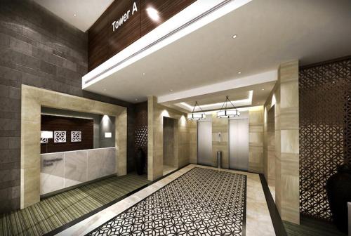 a lobby of a building with a rug on the floor at Stylish Furnsihed Apartments Opposite Five Hotel In JVC in Dubai