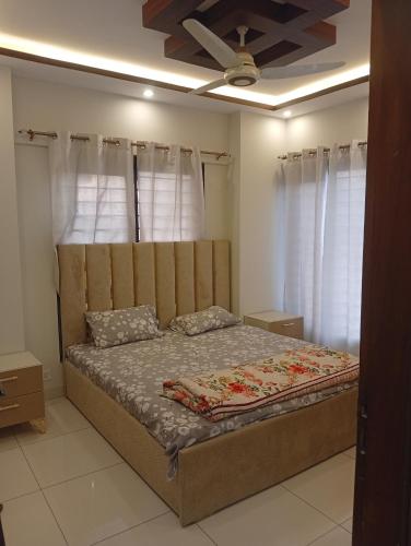 En eller flere senge i et værelse på Saima excellency