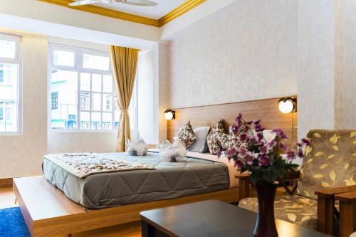 Postel nebo postele na pokoji v ubytování The Dzong ! MG MARG GANGTOK