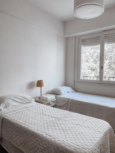 En eller flere senge i et værelse på Casino