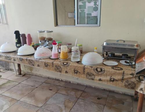 Příslušenství pro přípravu čaje a kávy v ubytování Pipa Hotel Pe na Areia