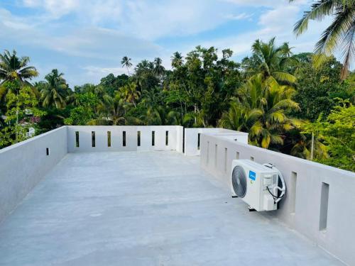 Een balkon of terras bij Villa C & C Thalpe